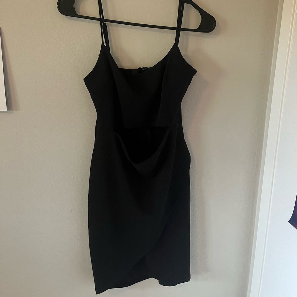 mini black dress with a cut